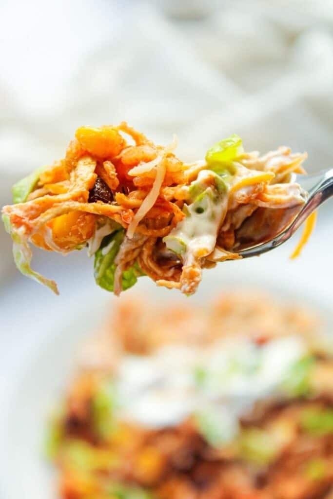 A bite of Instant Pot Burrito Bowls on a fork