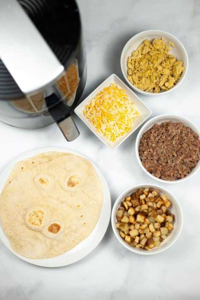Overhead photo of each ingredient in recipe with the air fryer as well