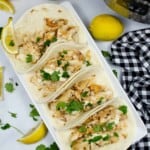 Rectangle plate full of fish tacos