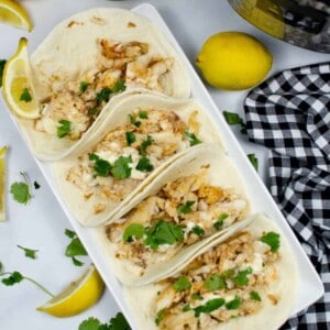 Rectangle plate full of fish tacos