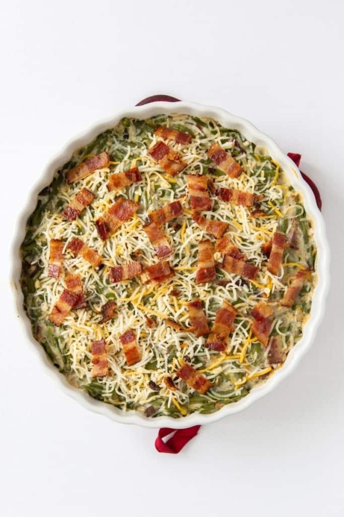 Bacon and cheese added onto the top of the green bean casserole