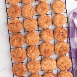 Snickerdoodle cookies on a cooling tray