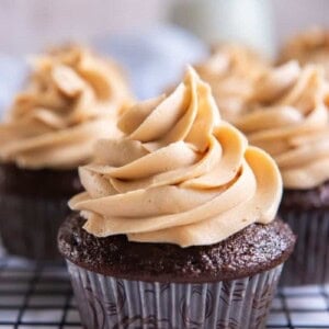 3 Ingredient Peanut Butter Frosting on top of a chocolate cupcake piped on