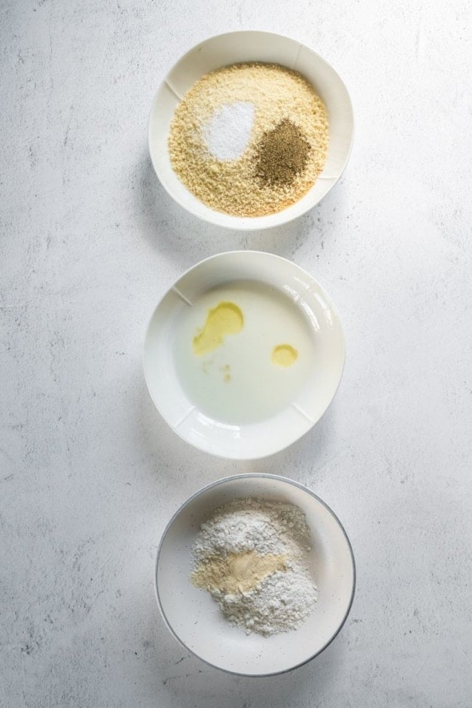 3 bowls for a dipping station including the breading, egg wash, and flour