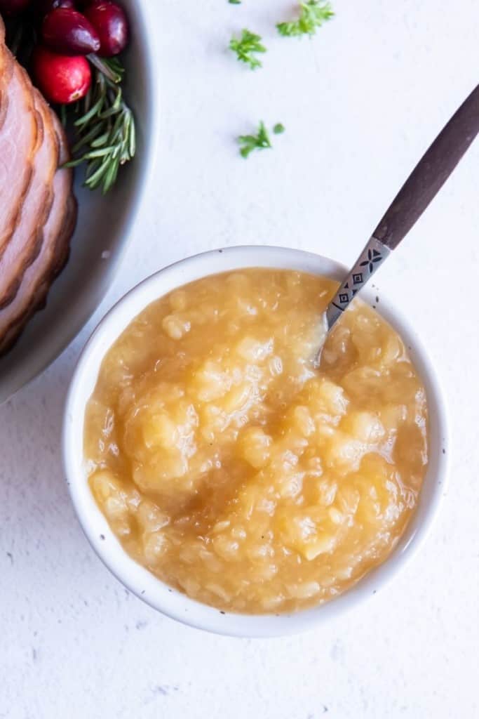 pineapple sauce for ham in bowl with spoon