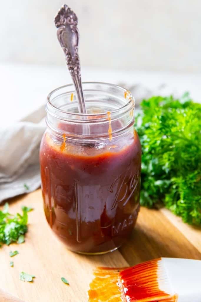 homemade 2 ingredient BBQ sauce in mason jar with spoon