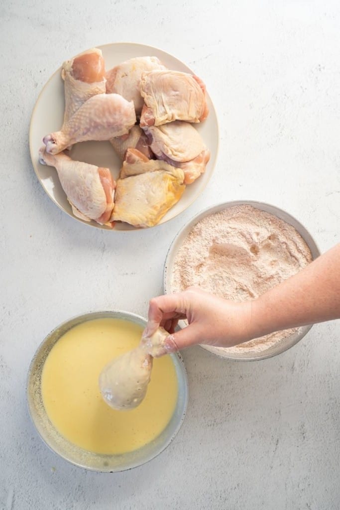 dip chicken drumsticks into buttermilk