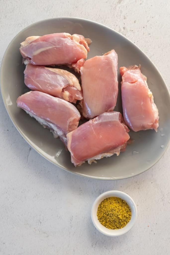 prepared ingredients for frozen chicken thighs in air fryer