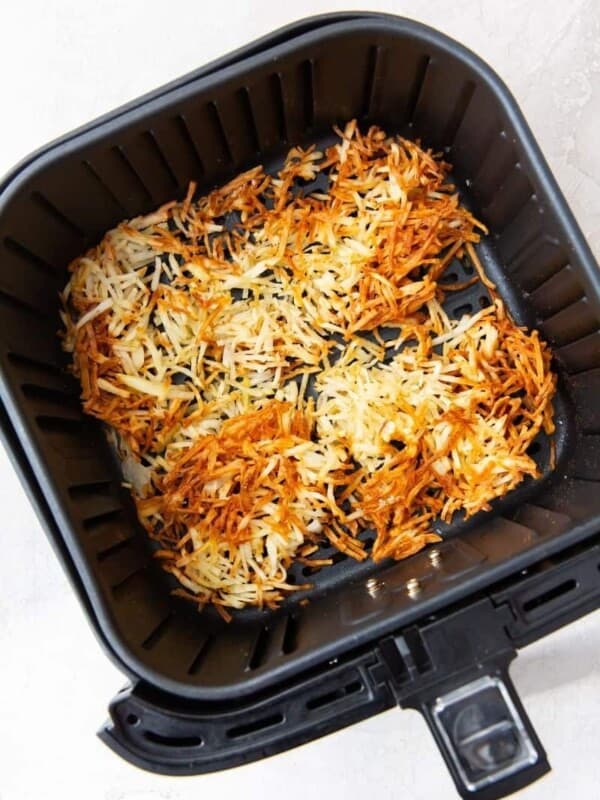flip hash browns in air fryer halfway to cook evenly on both sides