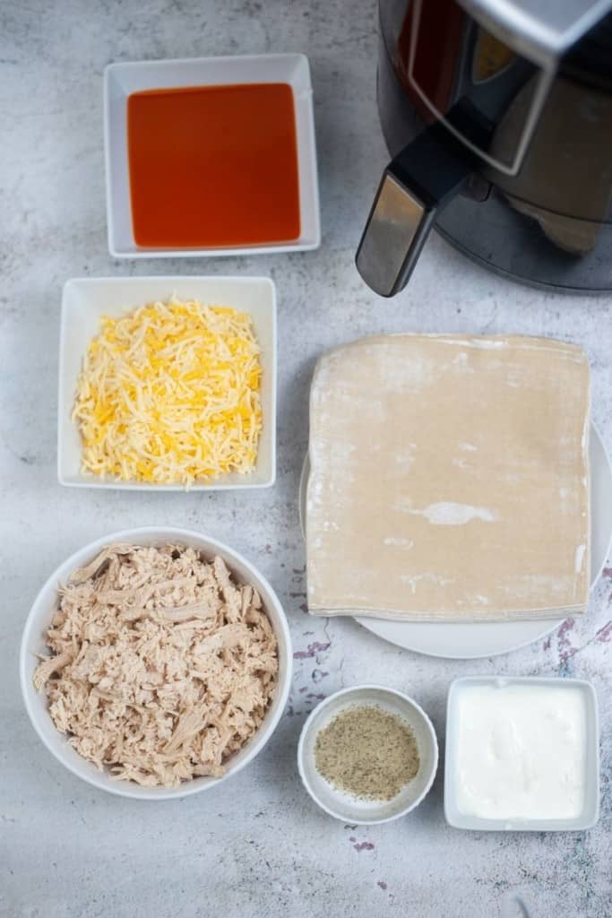 prepared ingredients for buffalo chicken egg rolls in air fryer