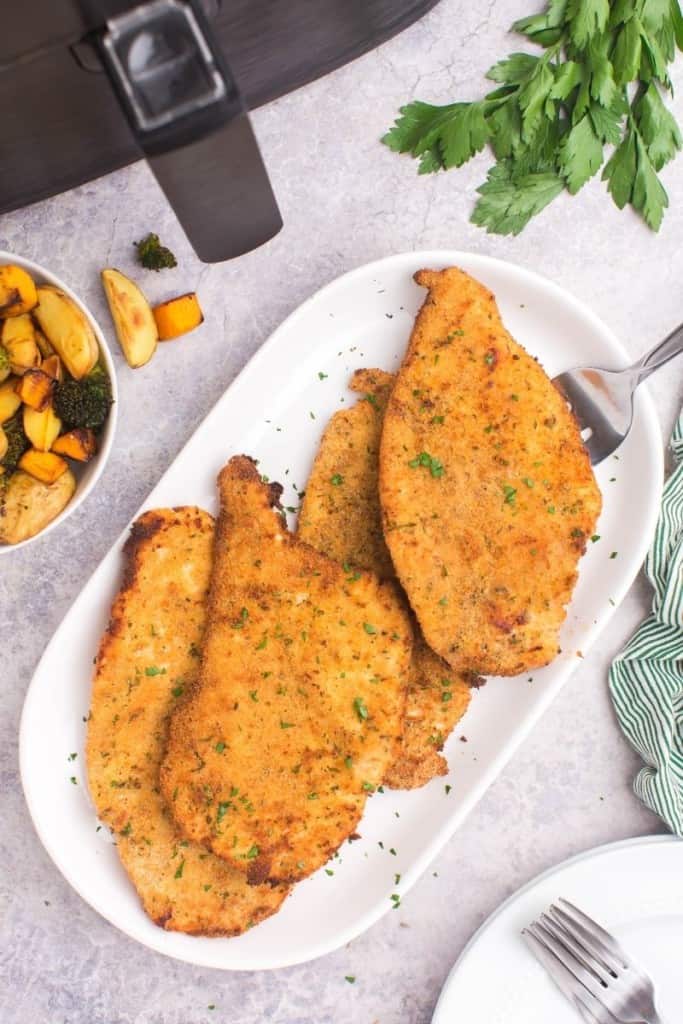 breaded chicken cutlets on plate