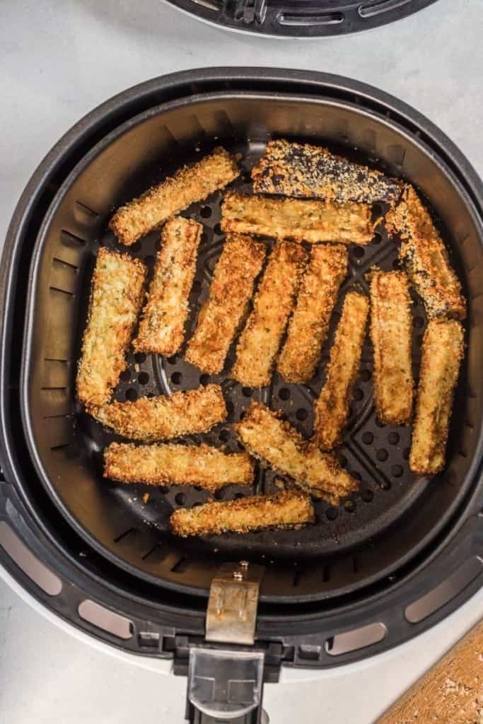 flip eggplant sticks over to cook all sides evenly