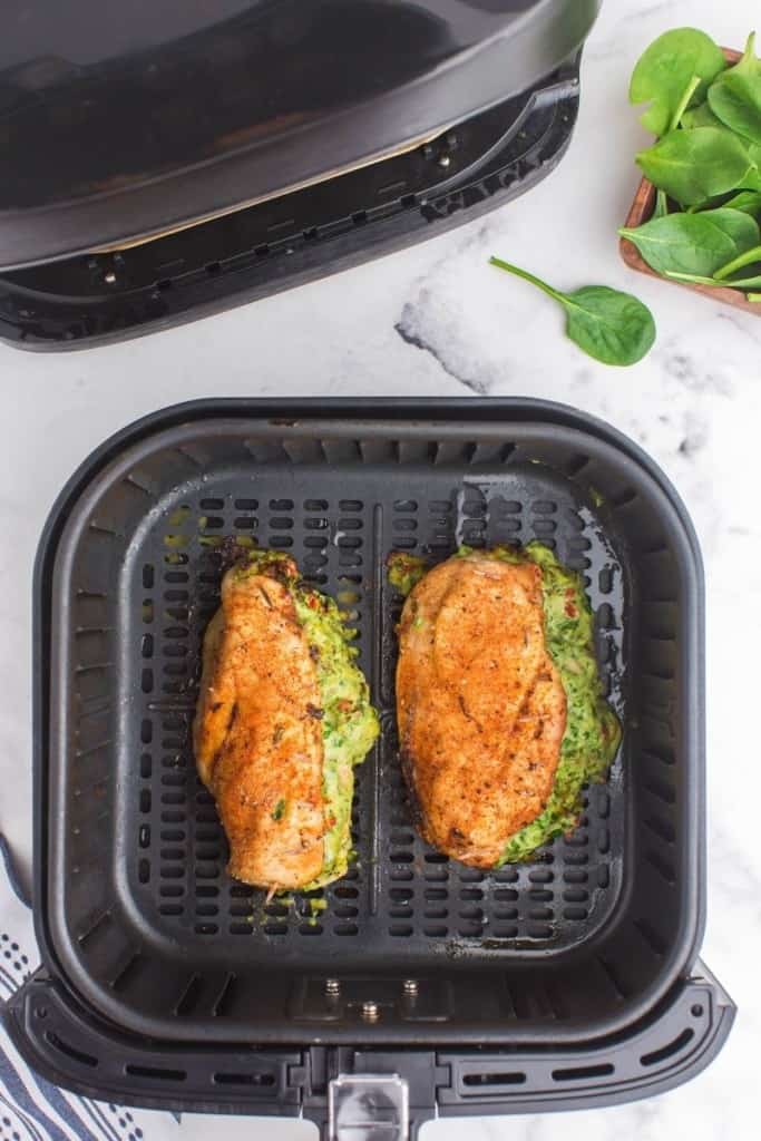 flip chicken breasts over to cook thoroughly