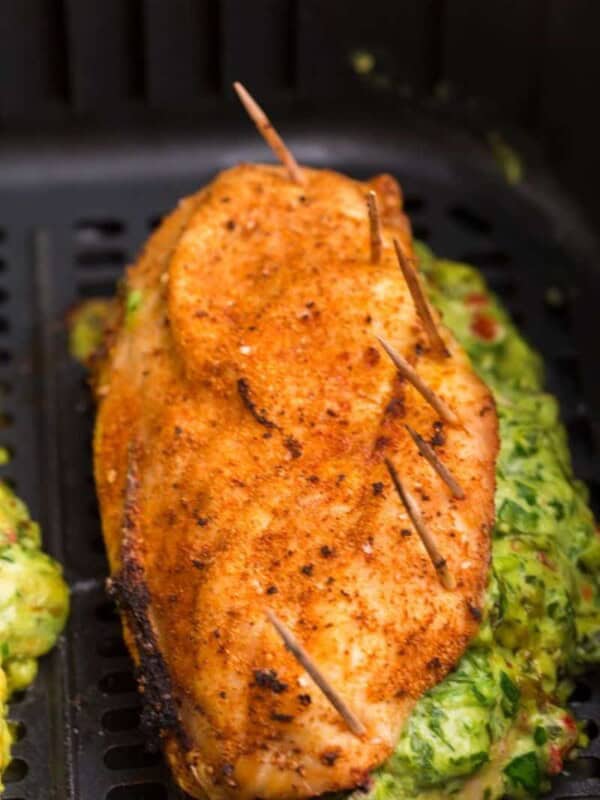 close up of stuffed chicken breast in air fryer