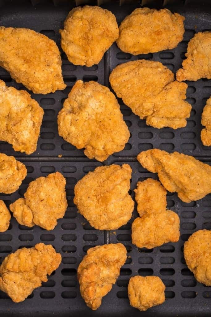 shake air fryer tray halfway through to cook popcorn chicken evenly