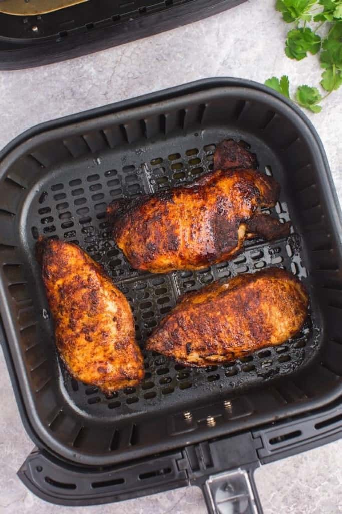 flip thick pork chops over to cook evenly in air fryer