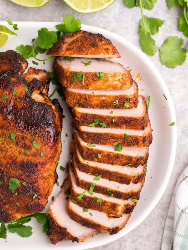 Thick pork chop cooked in air fryer in slices with cilantro lime seasoning