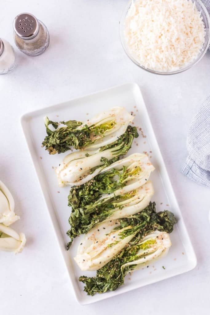 white try with bok choy in air fryer placed