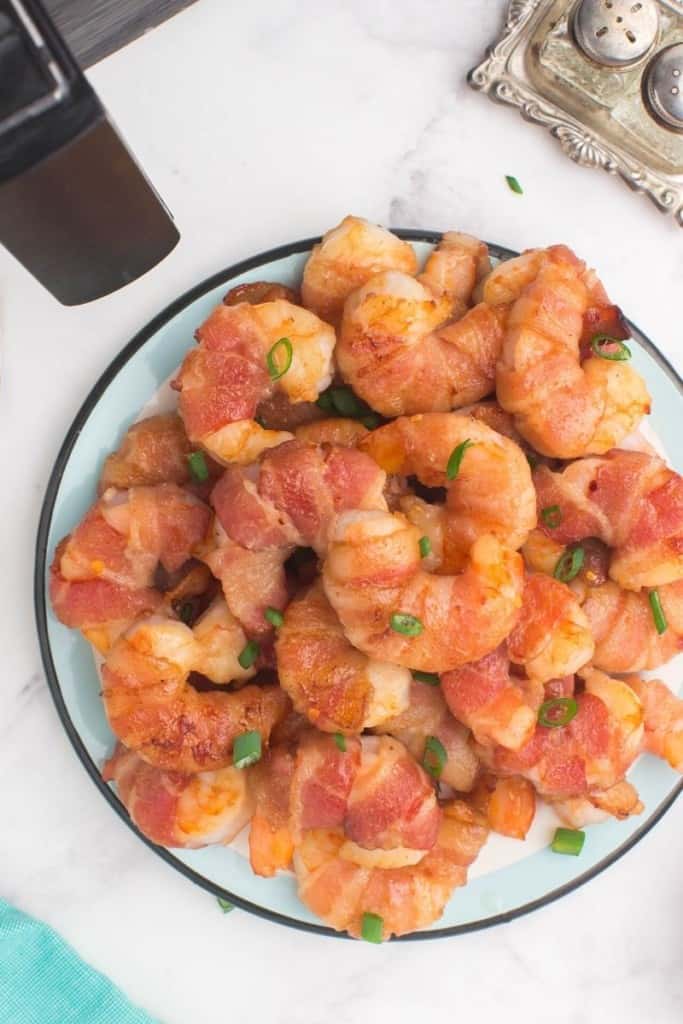 plate full of bacon-wrapped shrimp from air fryer