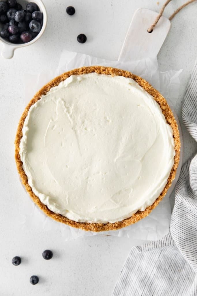 pour cream cheese mixture into graham cracker crust