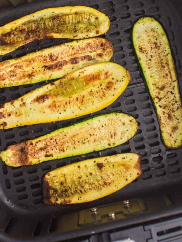slices of squash placed in air fryer