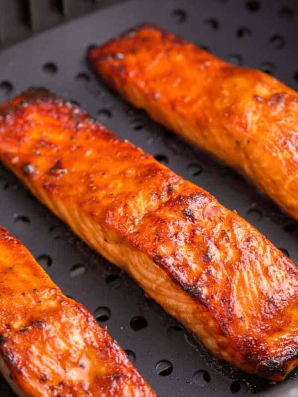 teriyaki salmon filets cooking in air fryer