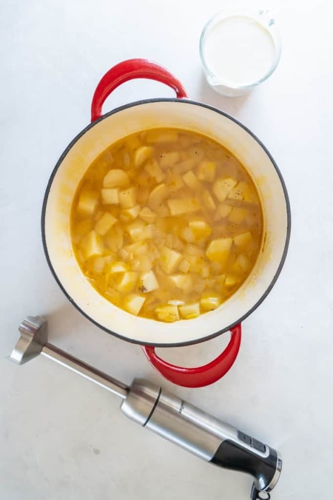 boil chicken broth and cook until potato slices are tender