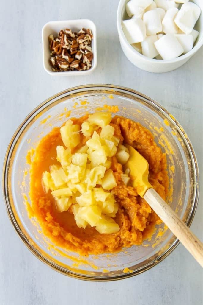 fold crushed pineapple into sweet potato mixture