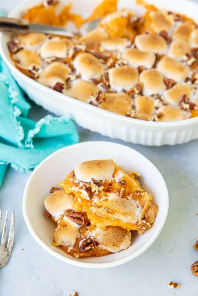 sweet potato casserole dished into white bowl
