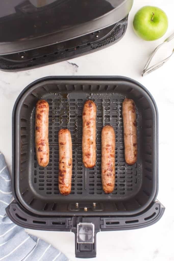 flip sausages halfway through cooking time for even crispiness