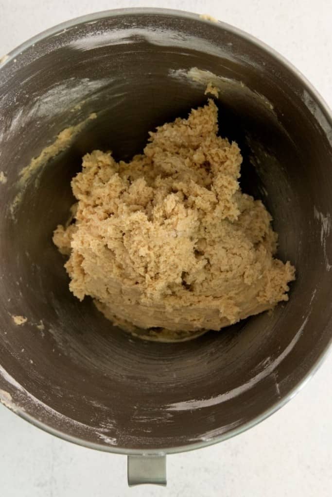 strawberry cheesecake cookie dough in mixer bowl