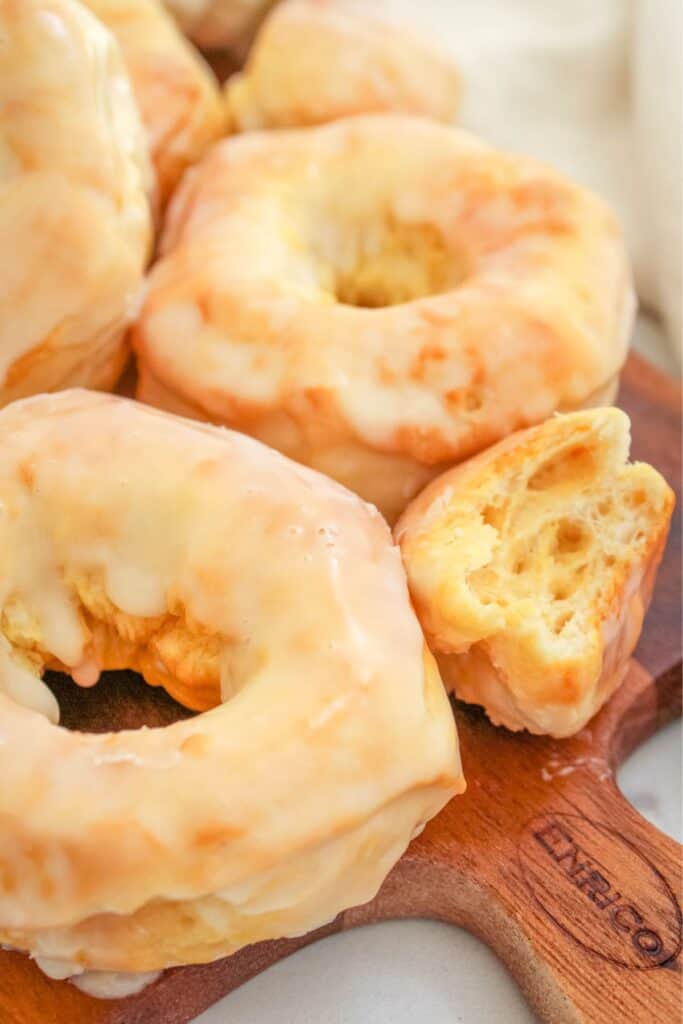 Close up of the air fryer donut recipe on a wooden serving board.