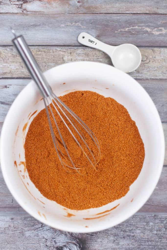 combining ingredients for homemade taco seasoning