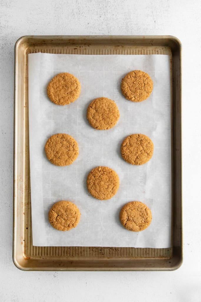 freshly baked pumpkin cookies on baking pan