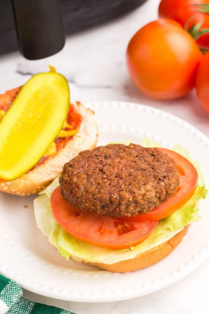 beyond burger on a bun on a white plate