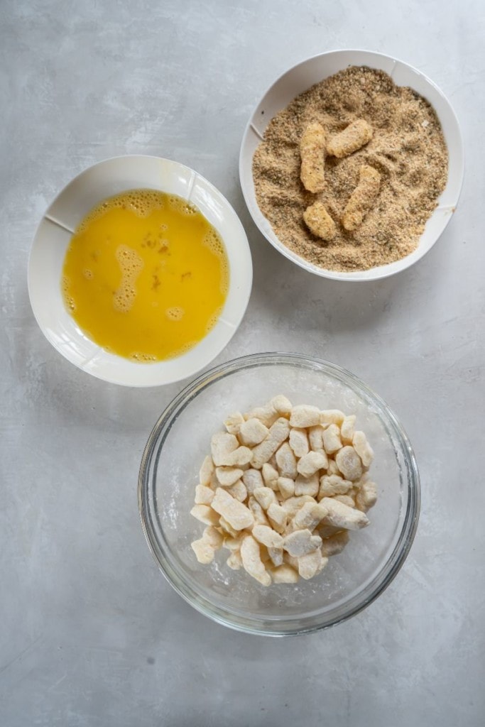 adding coating to cheese curds