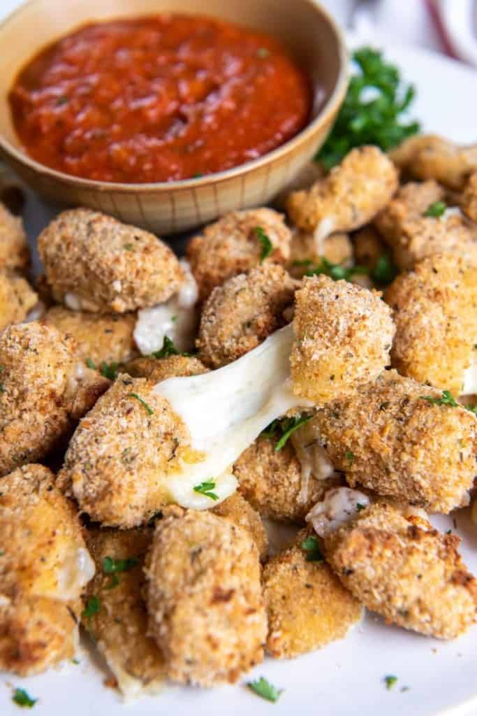pulling apart cheese curds
