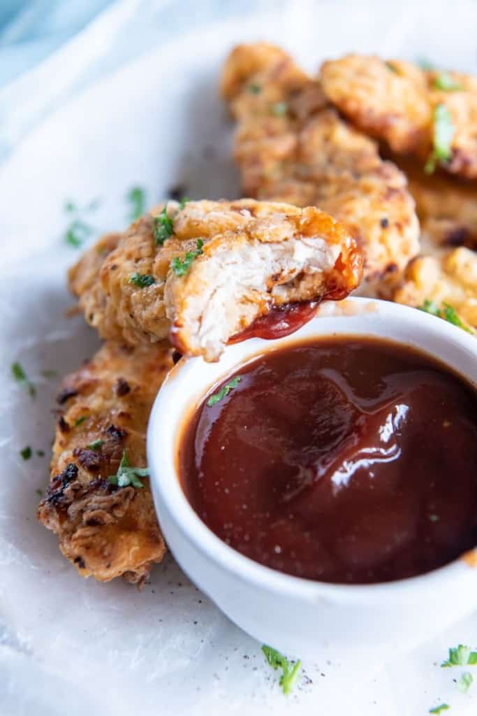 chicken tender with a bite out of it