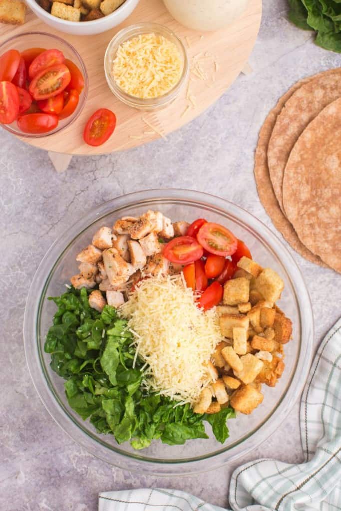 ingredients for a caesar wrap in bowl