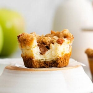 apple crisp cheesecake with bite out of it