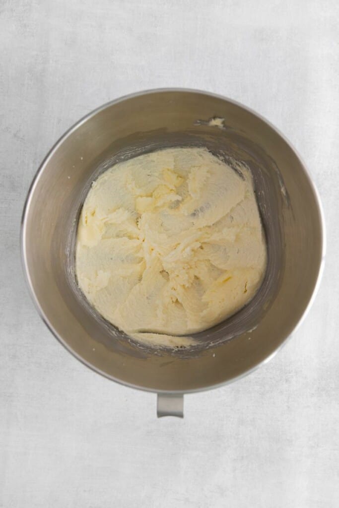 creaming together ingredients for sugar cookies