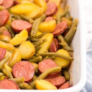 closeup of casserole dish with sausage green bean potato casserole