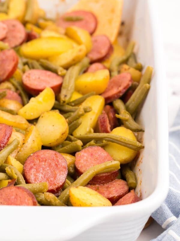 closeup of casserole dish with sausage green bean potato casserole