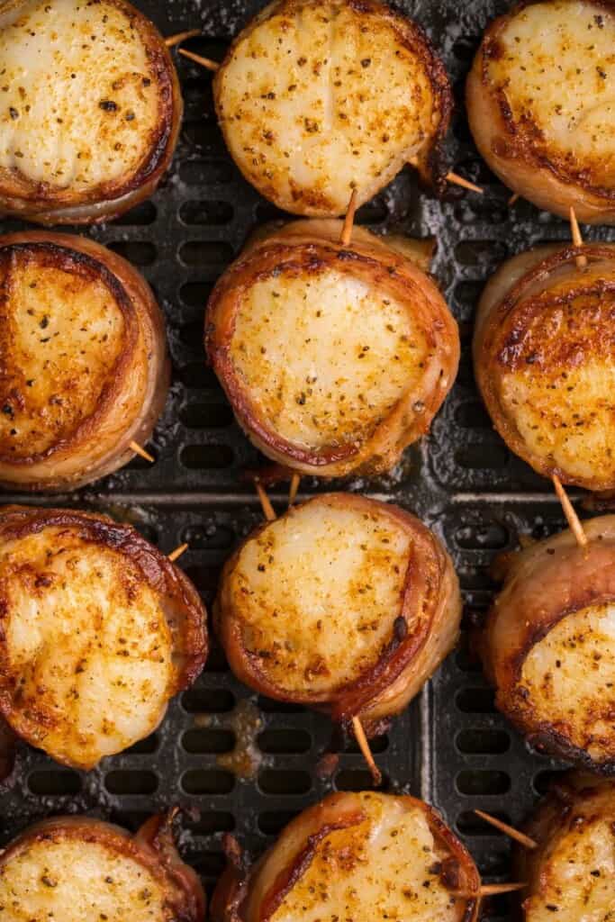 closeup of air fryer bacon wrapped scallops