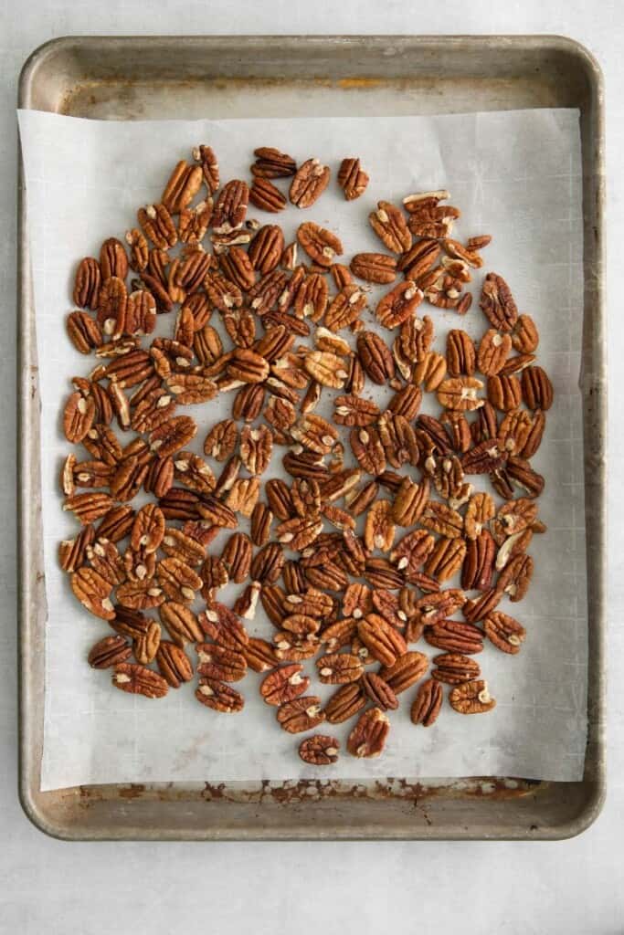 pecans on baking sheet