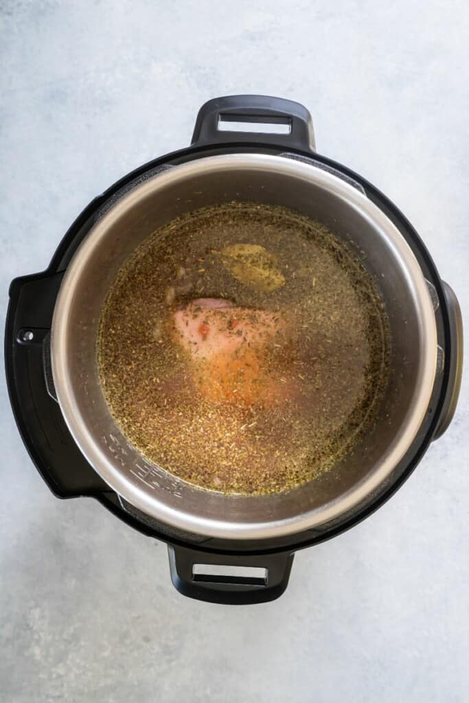 adding liquid into instant pot