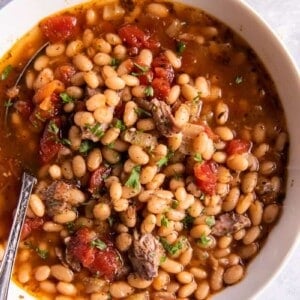 bowl with a spoon in it and bean soup