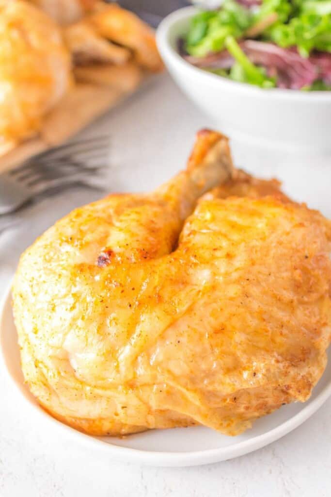 chicken leg quarter on plate