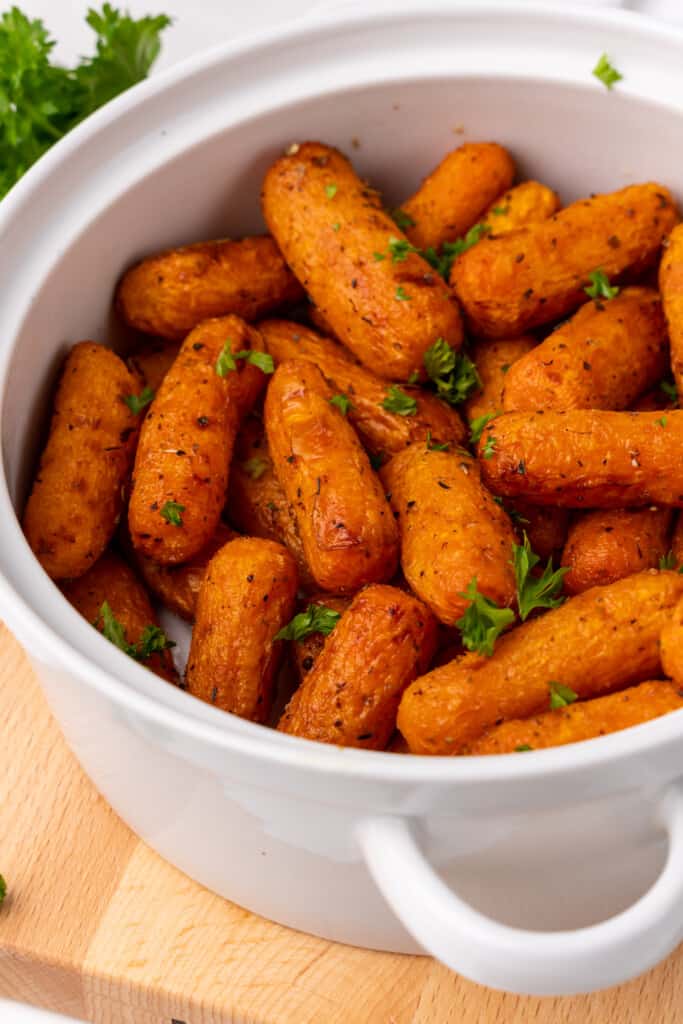 air fried baby carrots in white bowl