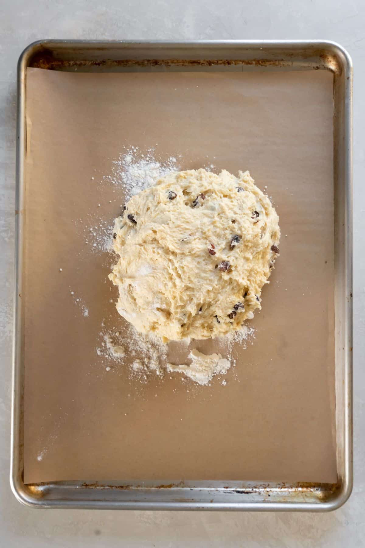Irish soda dough on a baking sheet.